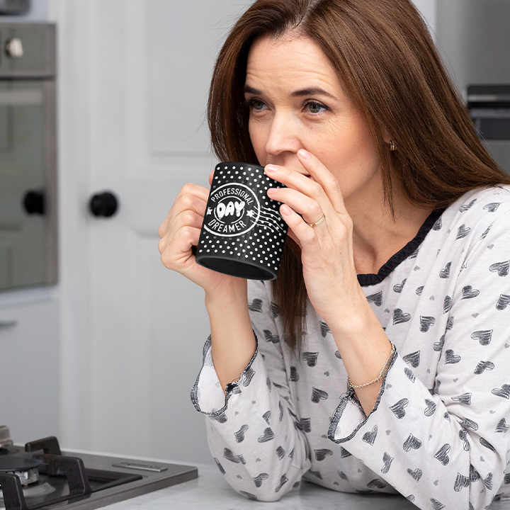 The Professional Day Dreamer Mug in Black