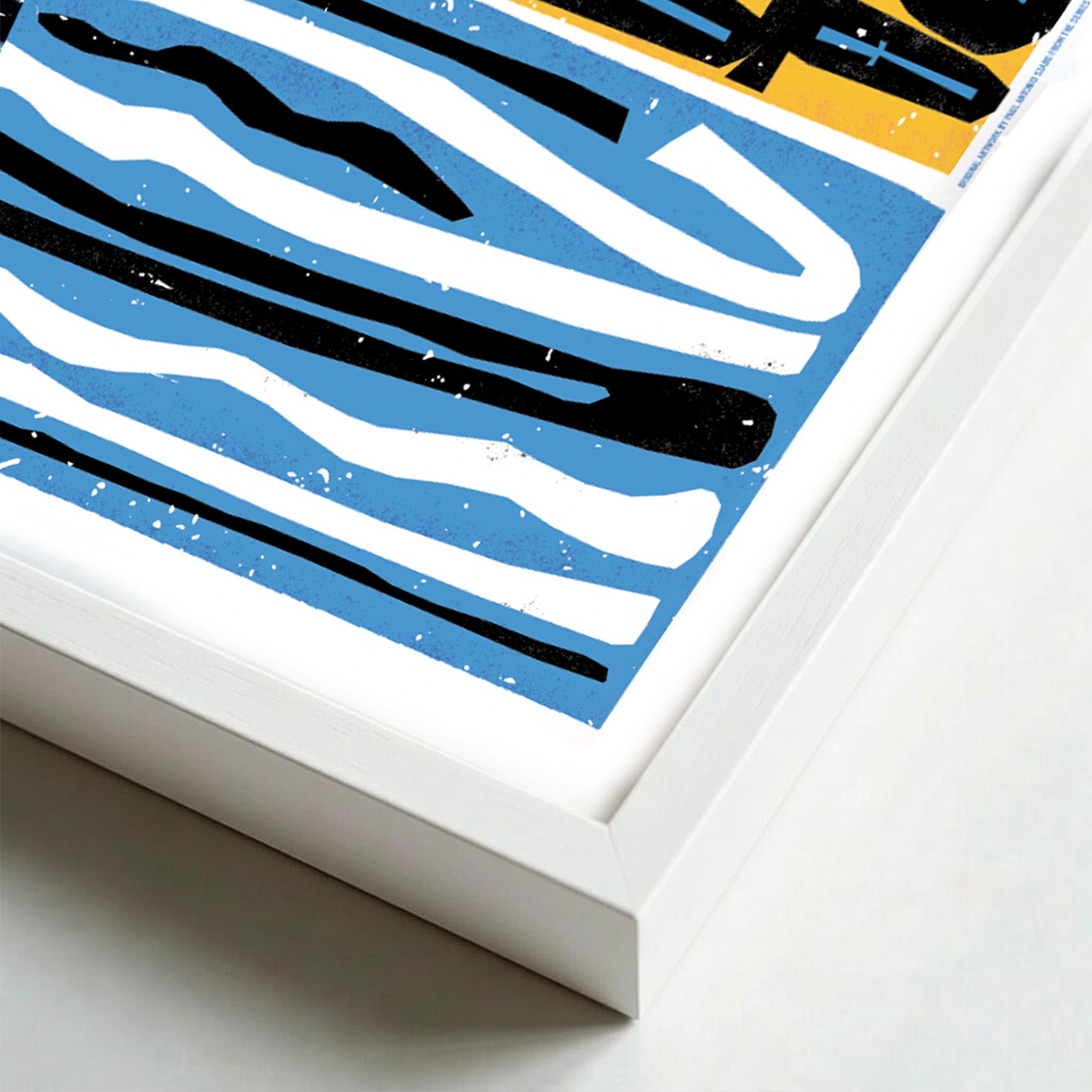 Close-up of a framed abstract artwork with blue, black, and white stripes.
